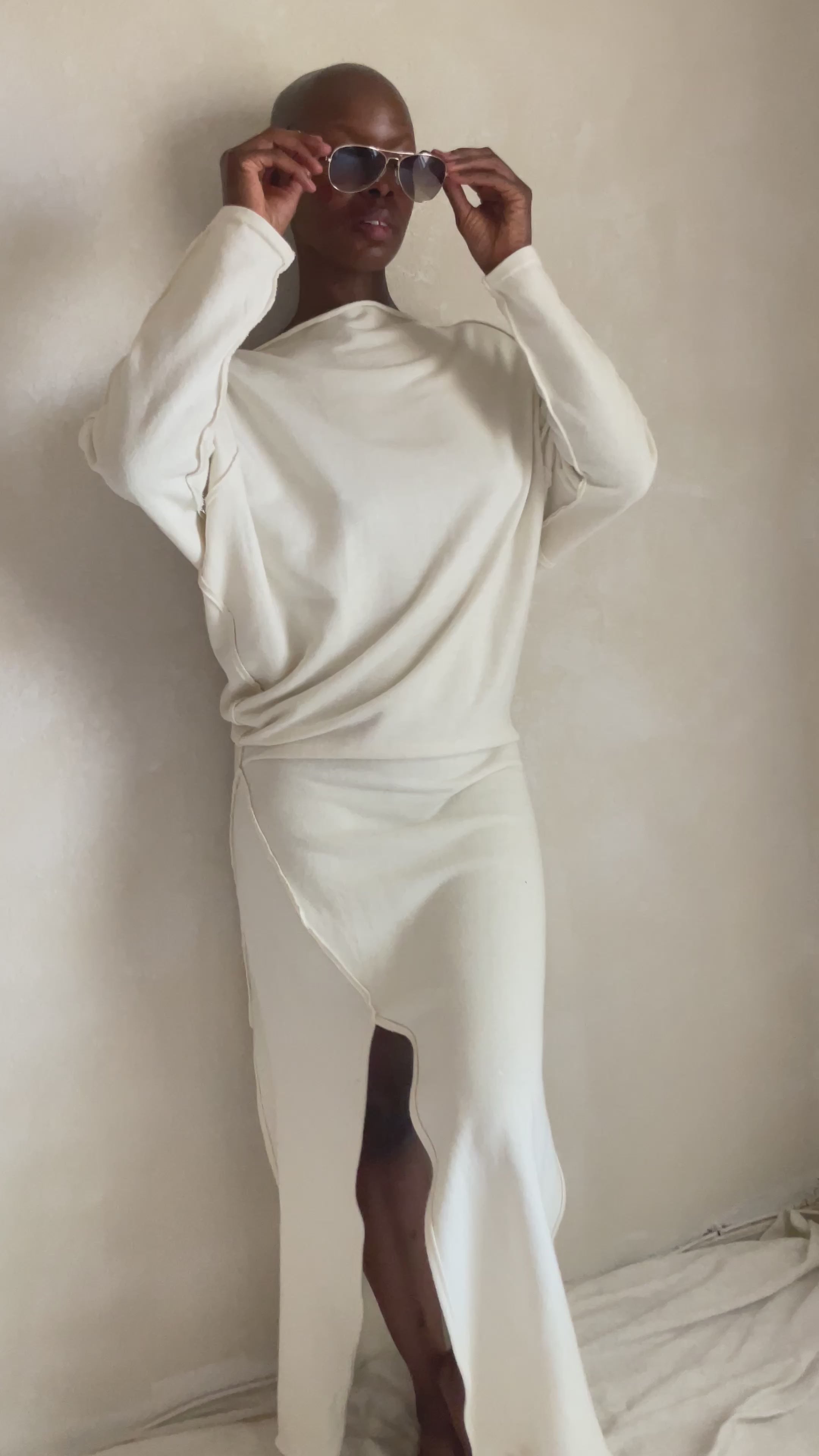 Video of white dolman dress