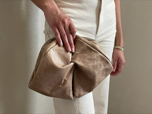 Tan leather twist bag